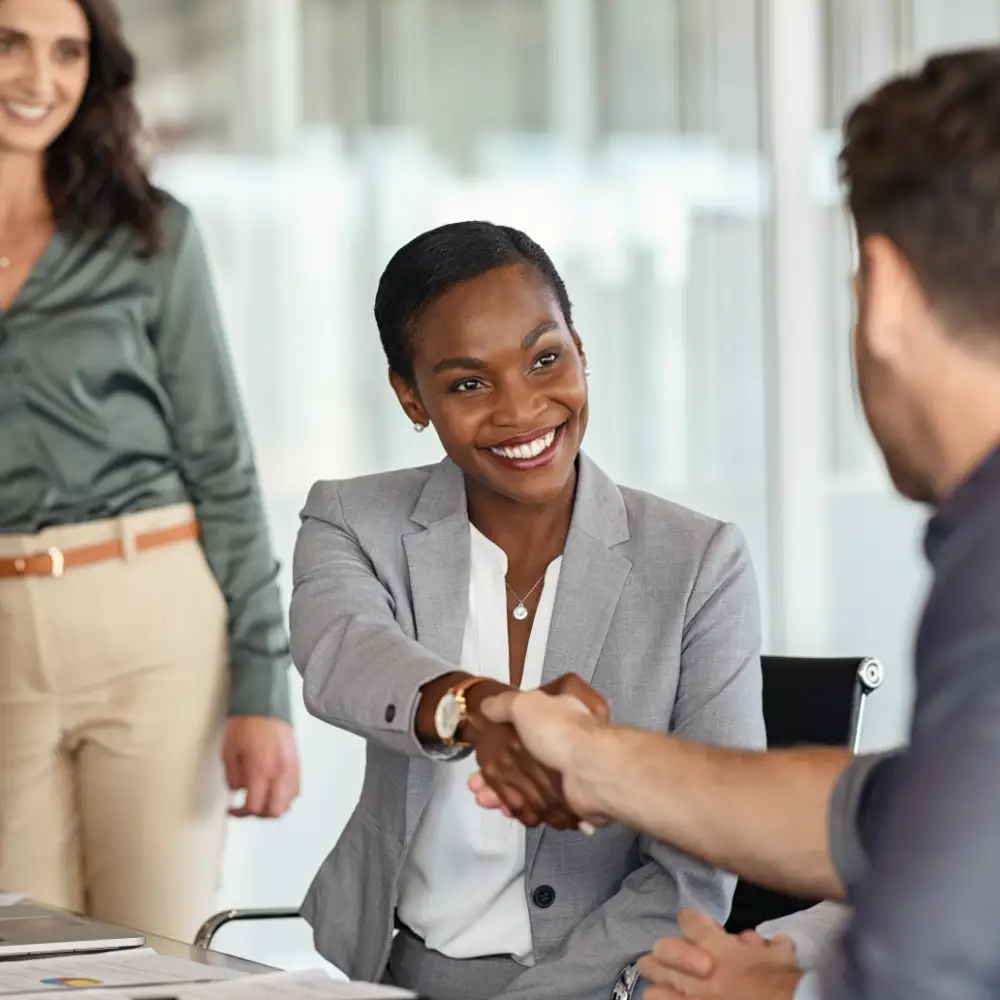 Professionals completing a successful business partnership